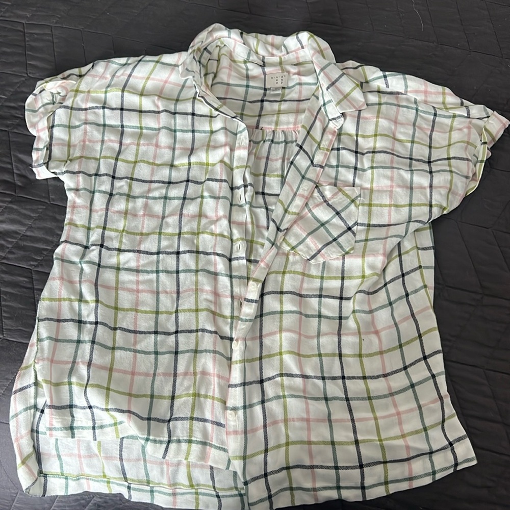 Checkered button down shirt.